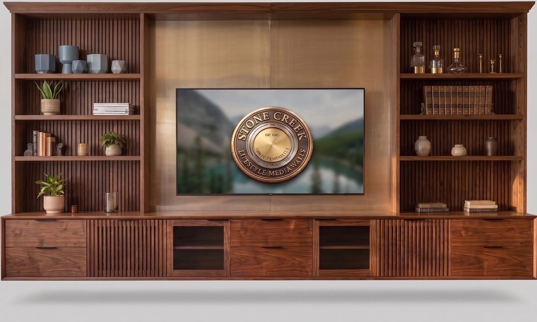 Walnut media wall with open shelves on both sides of a television and low cabinets below